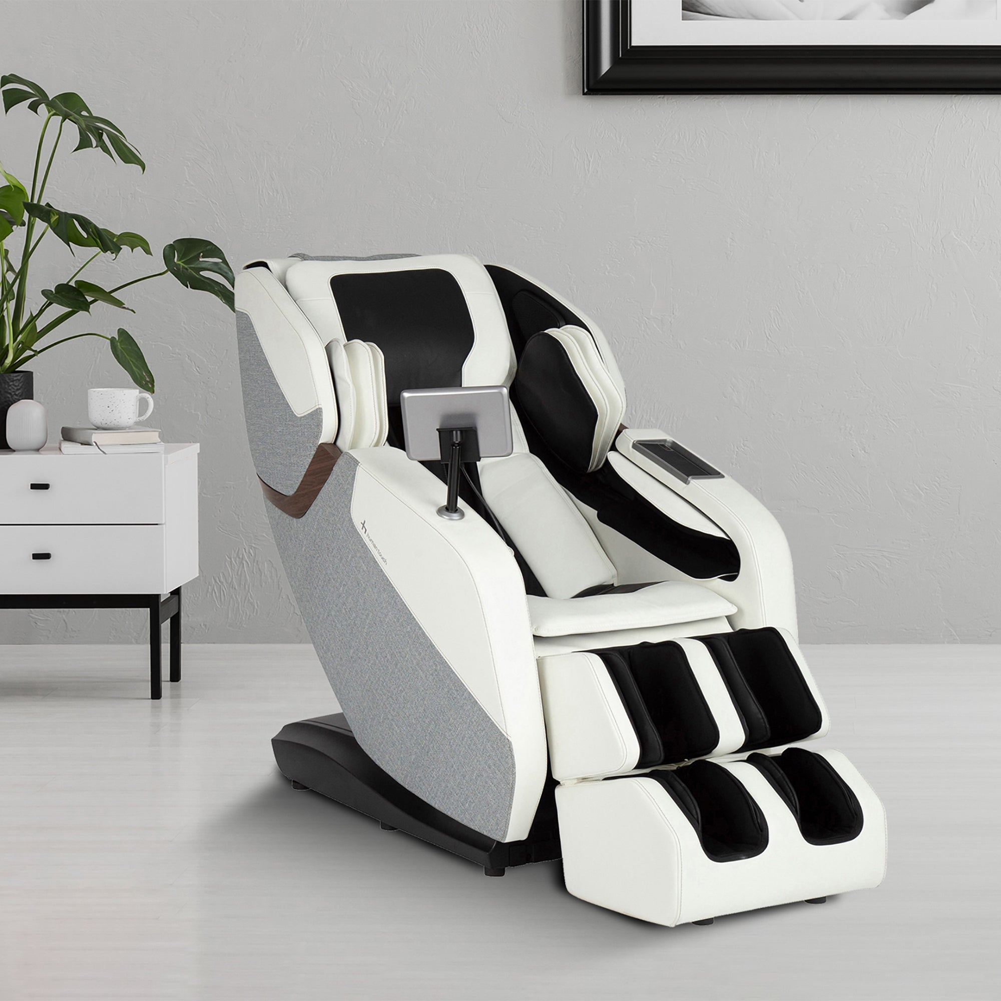 WholeBody ROVE massage chair in white and black with L-track design shown in modern living room setting